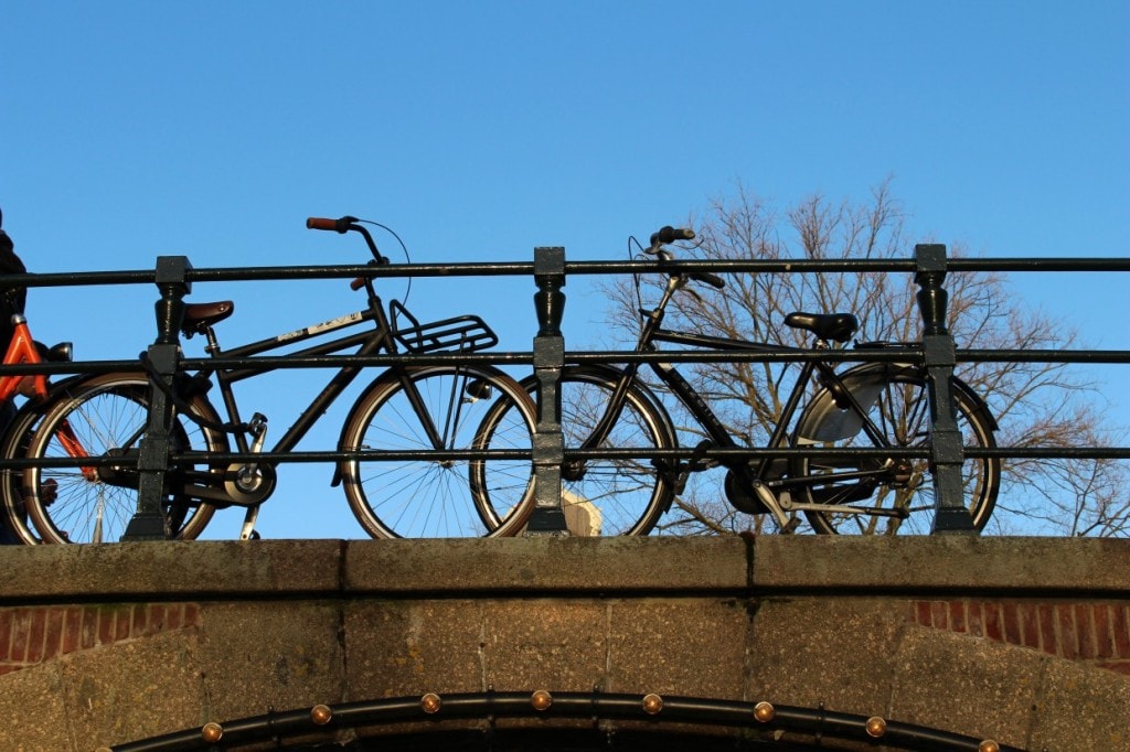 Amsterdam bicycles on top of bridge